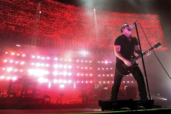 Emily Coovert//Kentucky Kernel
 Trent Reznor sings and plays guitar during the Nine Inch Nails concert Sunday night at Rupp Arena. NIN visited Lexington as a part of its Lights In The Sky Tour.