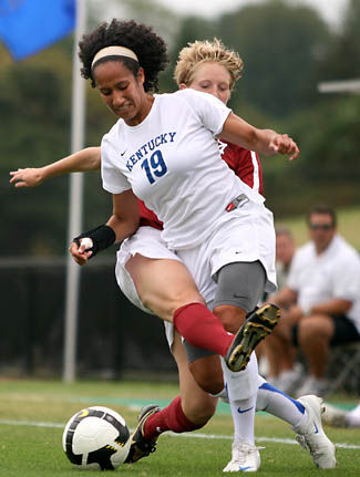 Kentucky forward Giuleana Lopez attempts to get the ball away from Alabama forward Grace Lawson at the UK womens soccer game against Alabama on Sunday, Sept. 28, 2008. Photo by Kristin Sherrard