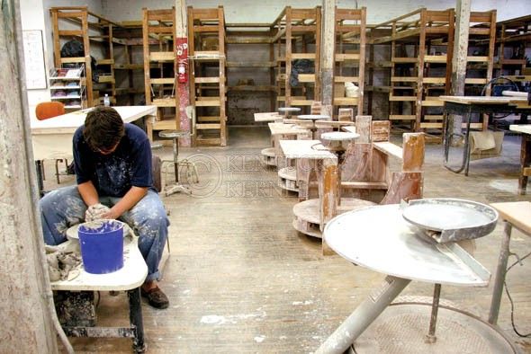 Allie Garza//Kentucky Kernel Art studio junior Will McComb works on a throwing wheel on Tuesday, Sept. 2, 2008.