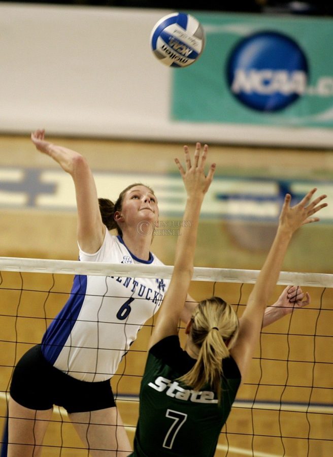 UK's Lauren Rapp attempts the kill against Michigan State at Memorial Coliseum on Friday, Dec. 4, 2009. Rapp let the team with 14 kills to help the Cats defeat the Spartans in the first round of NCAA tournament play. Photo by Scott Hannigan
