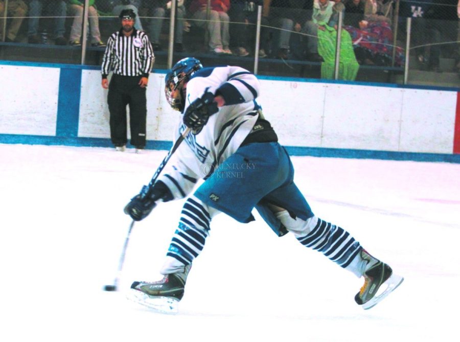 Forward Tony Valerino puts a shot on net for UK's first goal of the game against Ohio State University at Lexington Ice Center on Saturday, Dec. 5, 2009. The Cats were defeated by the Buckeys 5-4. Photo by Scott Hannigan