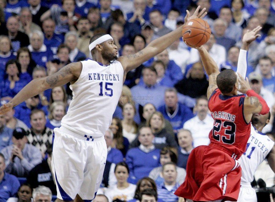 University of Kentucky freshman forward DeMarcus Cousins slaps the ball from Ole Miss' Trevor Gaskins in the second half of UK's 85-75 win over the Rebels on Tuesday, Feb. 2, 2010 in Rupp Arena. Photo by Ed Matthews