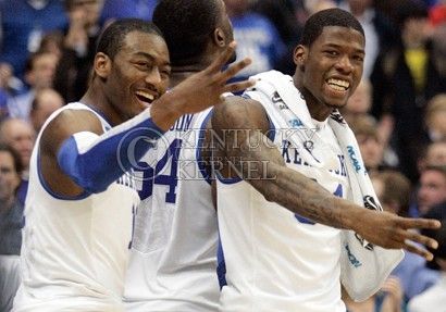 John Wall and DeAndre Liggins celebrate after UK's Sweet 16 win, 62-45, against Cornell at the Carrier Dome in Syracuse, NY on Friday, March 26, 2010. Photo by Britney McIntosh