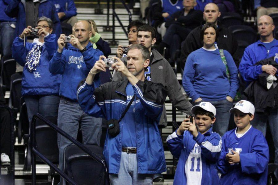 Fans+take+pictures+of+the+team+warming+up+before+the+UK+mens+basketball+teams+73-67+win+over+Alabama+in+the+quarterfinals+of+the+SEC+tournament+at+the+Sommet+Center+Friday%2C+March+12%2C+2010.+Photo+by+Britney+McIntosh