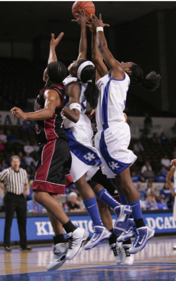 UK's Lydia Watkins, left, and Victoria Dunlap battle for the ball while playing Bellarmine University at Memorial Coliseum on Monday, Nov. 9, 2009. The Wildcats defeated Bellarmine 107-57. Photo by Scott Hannigan
