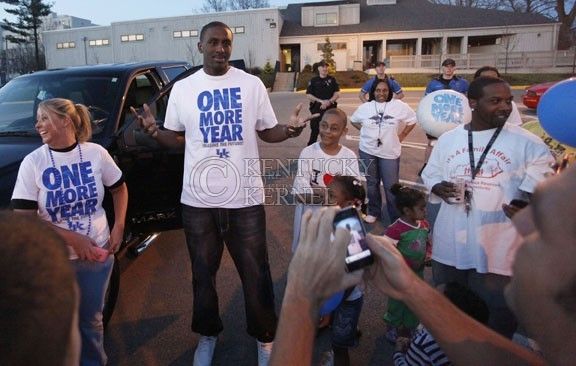 Patrick Patterson displays a One More Year shirt for fans during the Rally for One More Year held outside the WIldcat Lodge Thursday evening. Photo by Zach Brake