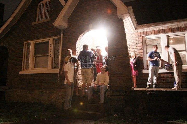 UK+students+enjoy+their+night+on+the+front+porch+of+a+house+on+University+Street+Friday+night.+University+Street+runs+perpendicular+to+Elizabeth+Street.+Photo+by+Scott+Hannigan