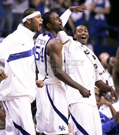 DeMarcus Cousins, Patrick Patterson and John Wall cheer as junior forward Josh Harrellson makes a basket against Clarion at Rupp Arena on Friday, Nov. 6, 2009. The Cats won 117-52 over the Golden Eagles. Photo by Adam Wolffbrandt