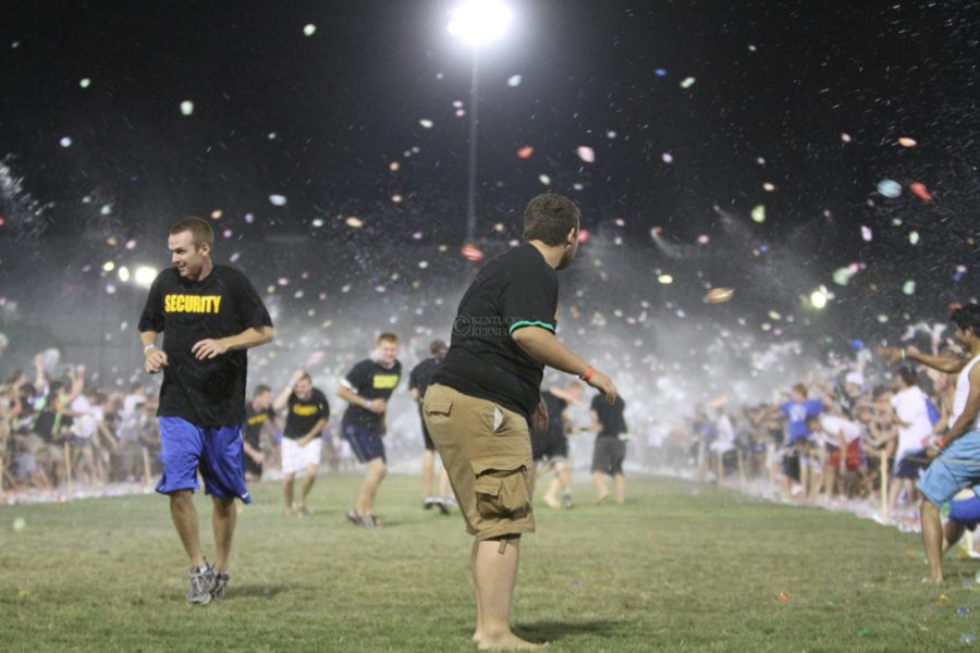 Security controlled the crowd on the Johnson Center field on Friday, August 27, 2010. The crowd had gathered in order to attempt to break the world record for the world's largest water balloon fight. In place were two rows of water balloons, people were not allowed in the center, between the two rows. .Latara Appleby