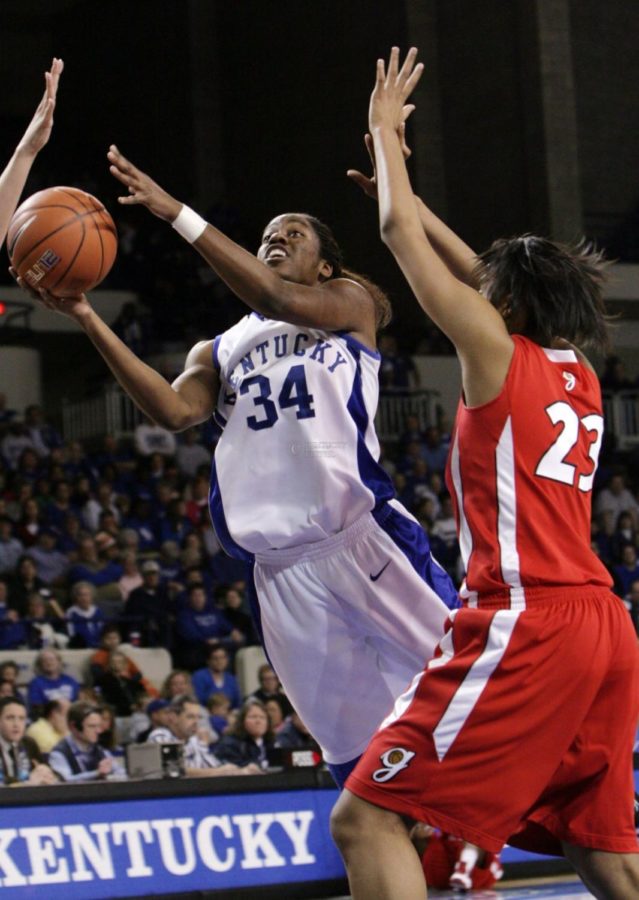 Junior Victoria Dunlap takes a shot in the first half of UK's game against Georgia at Memorial Coliseum on Thursday evening. Photo by William Baldon