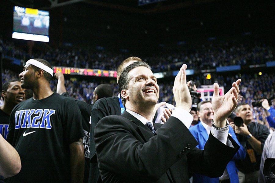 Head coach John Calipari applaudes after the UK men's basketball 88-44 win over Drexel at Rupp Arena on Monday, Dec. 21, 2009. Photo by Adam Wolffbrandt