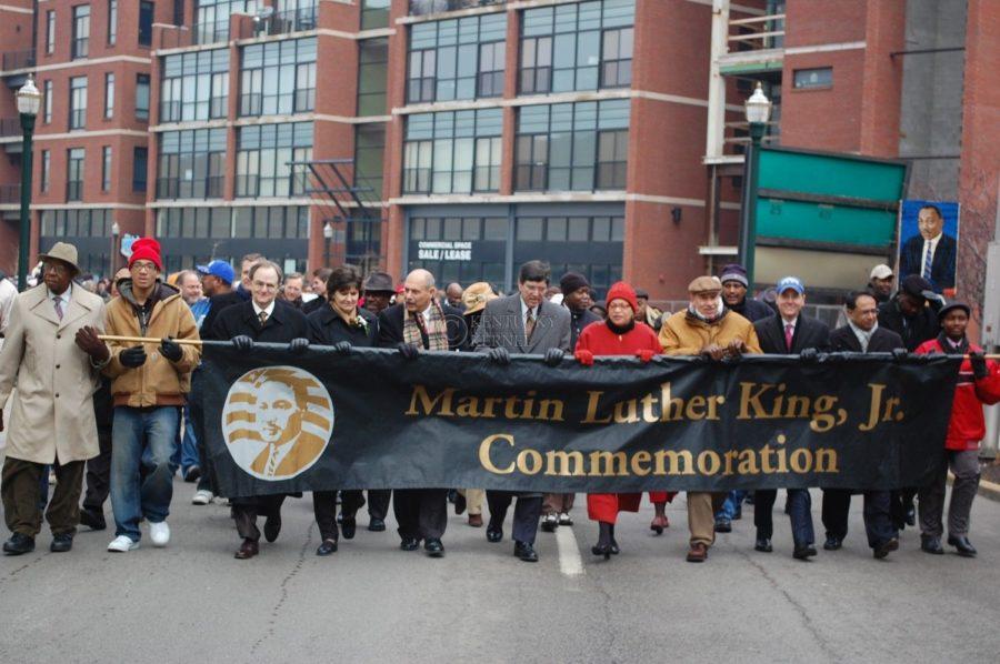 President+Lee+Todd+leads+the+march+holding+a+commemoration+banner+with+other+Lexington+officials+including+Mayor+Jim+Newberry+%28center%29+for+Martin+Luther+King%2C+Jr.+day+in+downtown+Lexington+on+Jan.+18%2C+2010.+Photo+by+Brandon+Goodwin