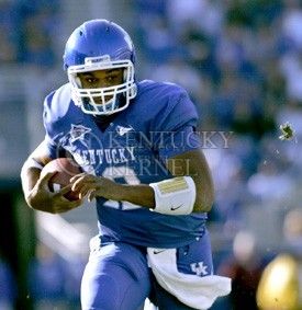 Freshman quarterback Morgan Newton runs the ball for the Cats during their game against EKU on Saturday, Nov. 7, 2009 at Commonwealth Stadium. The Cats defeated the Colonels 37-12.