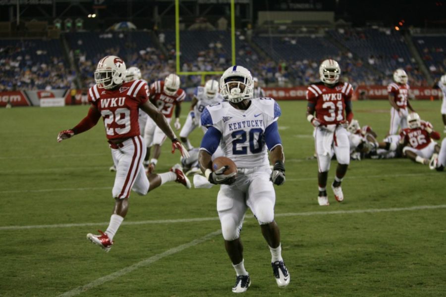 UK tailback Josh Clemons celebrates his touchdown during the first half of UKs season opener against Western Kentucky at LP Field in Nashville, Tennessee. Monday, Sept. 1, 2011 in Lexington, Ky. Photo by Brandon Goodwin