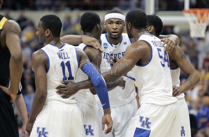 The UK men's basketball team huddles after John Wall gets a foul called on him in the second half of UK's Elite 8 loss to West Virginia at the Carrier Dome in Syracuse, NY on Saturday, March 27, 2010. Photo by Britney McIntosh