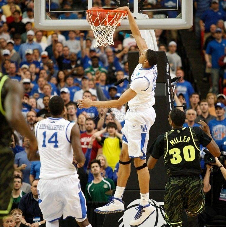 Anthony Davis dunks the ball in the first half of the south region final between the University of Kentucky and Baylor University in the NCAA Tournament, in the Georgia Dome, on Sunday, March 25, 2012, in Atlanta. Photo by Latara Appleby