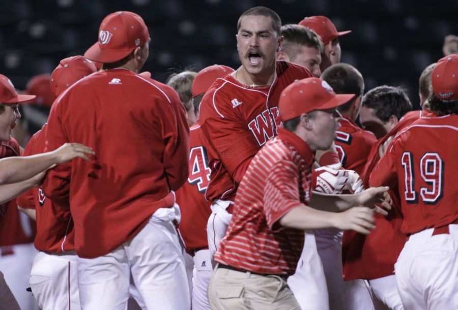 Western+Kentucky+senior+first+basemen+Ryan+Huck+celebrates+a+walk+off+home+run+in+the+18th+inning+in+Bowling+Green%2C+Ky.%2C+on+Wednesday%2C+April+24%2C+2013.+WKU+defeated+UK+3-2+in+18+innings.+Photo+by+Michael+Reaves