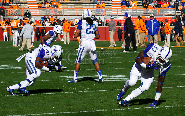 (Left to Right) Freshman running backs Justin Taylor and Dyshawn Mobley go through warm-up drills before the game Saturday against the Tennessee Volunteers in Knoxville, Tn., on Saturday, November, 24, 2012. Photo by James Holt