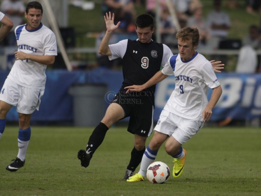 Tyler+Riggs+%239+dribbles+against+South+Carolina+in+Lexington%2C+Ky.%2C+on+Sunday%2C+October+13%2C+2013.+Photo+by+Gary+Hermann