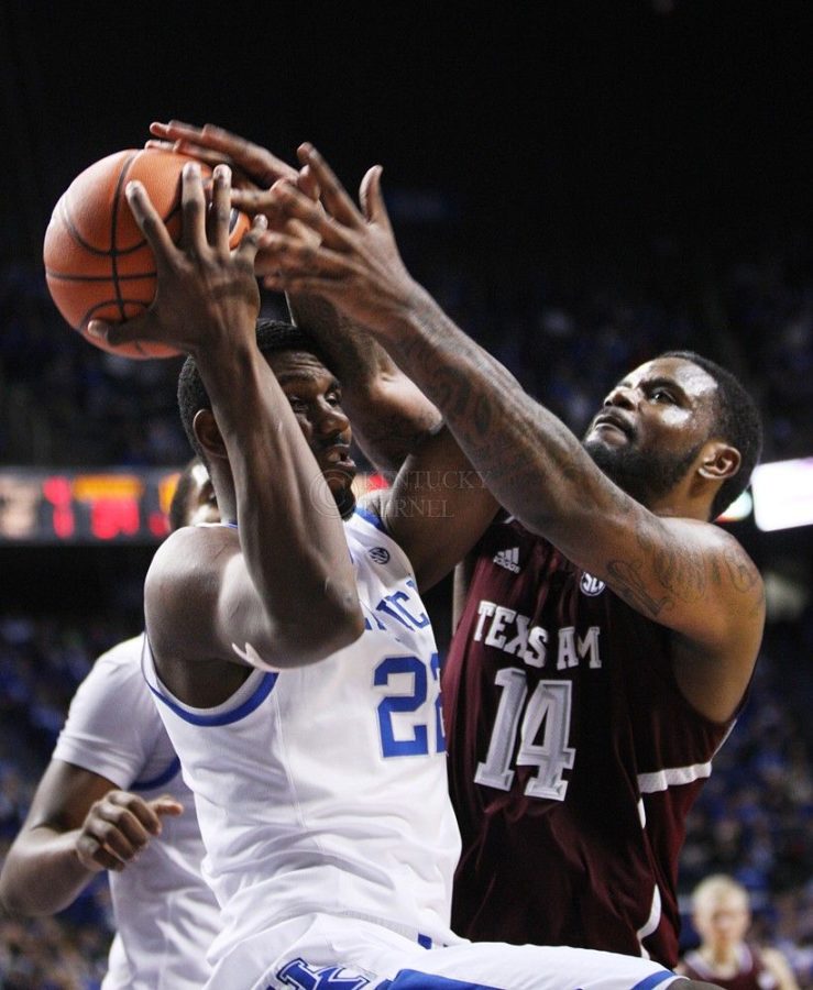 Kentucky Wildcats forward Alex Poythress (22) and Texas A&amp;M forward Kourtney Roberson (14) fight for the ball during the second half of UK Men's Basketball vs. Texas A&amp;M at Rupp Arena in Lexington, Ky., on Tuesday, January 21, 2014. UK defeated Texas A&amp;M 68-51. Photo by Emily Wuetcher