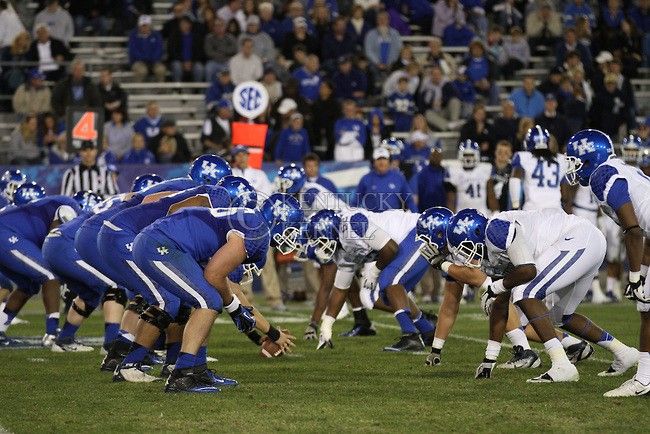 Cats on Cats. The blue team lines up on offense across from the white team. in Lexington, Ky., on Saturday, April, 13, 2013. Photo by James Holt