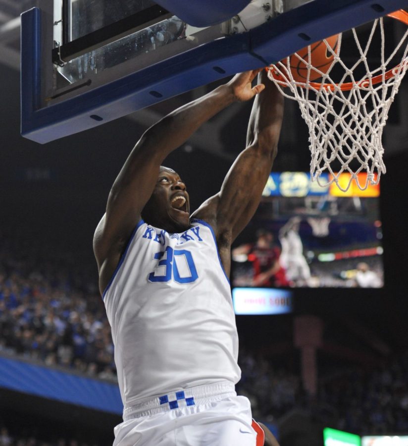 UK+forward+Julius+Randle+%2830%29+scores+UKs+first+points+during+the+first+half+of+the+UK+Mens+Basketball+game+vs.+Louisville+at+Rupp+Arena+in+Lexington%2C+Ky.%2C+on+Saturday%2C+December+28%2C+2013.+UK+leads+UofL+41+to+36+at+the+half.+Photo+by+Eleanor+Hasken