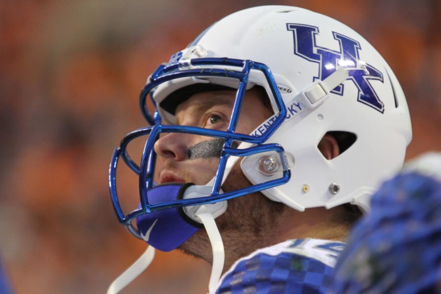 Kentucky+quarterback+Patrick+Towles+checks+the+scoreboard+during+a+stoppage+of+play+during+the+first+half+of+the+University+of+Kentucky+vs.+University+of+Tennessee+mens+football+game+at+Neyland+Stadium+in+Lexington%2C+Tn.%2C+on+Saturday%2C+November+15%2C+2014+Photo+by+Jonathan+Krueger