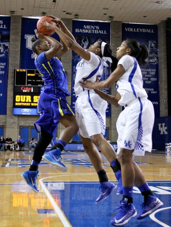 Kentucky+guard+Bria+Goss+bocks+a+Morehead+State+player+during+the+first+half+of+the+UK+Hoops+vs.+Morehead+State+womens+Basketball+game+at+Memorial+Coliseum+in+Lexington+%2C+Ky.%2C+on+Tuesday%2C+November+18%2C+2014.+Photo+by+Jonathan+Krueger