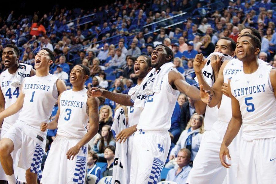 The+Kentucky+Wildcats+bench+react+to+a+dunk+during+the+second+half+of+the+game+against+the+University+of+Georgetown+Tigers+at+Rupp+Arena+on+Sunday%2C+November+9%2C+2014+in+Lexington%2C+Ky.+Kentucky+defeated+Georgetown+121-52.+Photo+by+Michael+Reaves