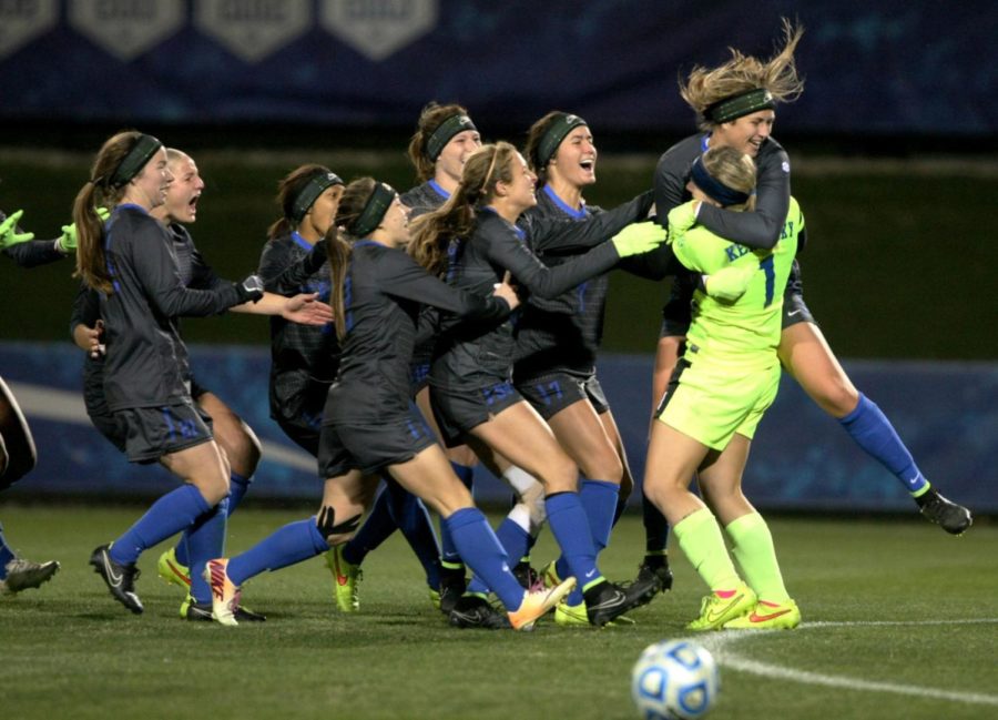 The+UK+team+celebrates+winning+the+game+with+freshman+goalkeeper+Taylor+Braun+%281%29+after+the+University+of+Kentucky+vs.+Southern+Illinois+University+Edwardsville+womens+soccer+game+at+the+Soccer+Complex+in+Lexington%2C+Ky.%2C+on+Saturday%2C+November+15%2C+2014.+The+game+was+the+first+round+of+the+2014+NCAA+tournament+and+UK+won+4-2+in+overtime+penalty+kicks.+Photo+by+Tessa+Lighty