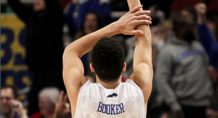 Kentucky guard Devin Booker throws up a hand sign after scoring a three pointer during the first half of the UK vs. UCLA game at the United Center in Chicago , Il., on Saturday, December 20, 2014. Photo by Jonathan Krueger