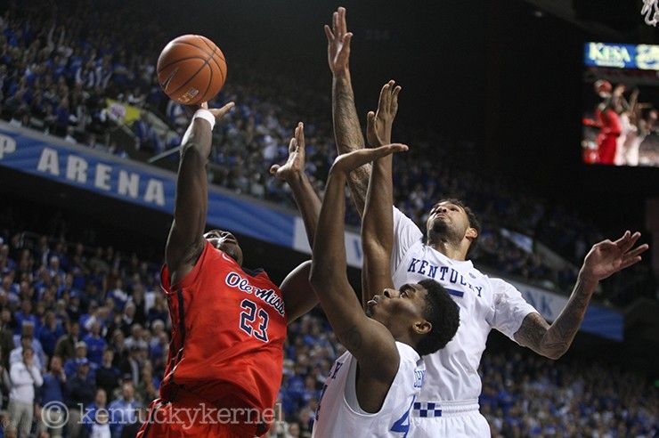UK's Willie Cauley-Stein (15) and Dakari Johnson (44) go up for the block against Ole Miss center, Dwight Coleby (23) during the second half of the UK vs. Ole Miss basketball game at Rupp Arena. Tuesday, January 6, 2015 in Lexington. Photo by Joel Repoley