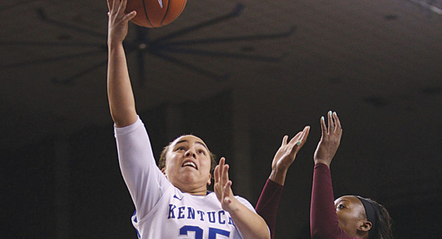 UK+guard+Mikayla+Epps+puts+up+a+layup+under+pressure+from+Mississippi+State+forward+Victoria+Vivians+at+the+University+of+Kentucky+vs.+Mississippi+State+womens+basketball+game+in+Memorial+Coliseum+in+Lexington%2C+Ky.%2C+on+Thursday%2C+February+12%2C+2015.+Kentucky+defeated+Mississippi+92-90.+Photo+by+Cameron+Sadler