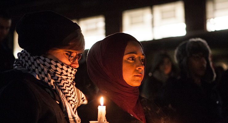 Special+education+MSD+senior+Becky+Goodwin+and+counseling+psychology+masters+student+Hadeel+Ali+listen+during+the+candlelight+vigil+held+by+the+Muslim+Student+Association+at+the+Memorial+Hall+Amphitheater+on+Friday%2C+February+13%2C+2015+in+Lexington%2C+Ky.+Photo+by+Adam+Pennavaria