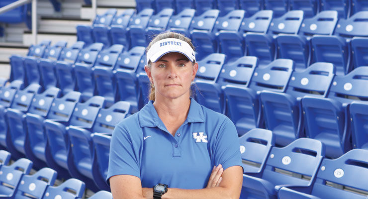 UK Softball coach Rachel Lawson teaches her team hard work by having them do what needs to be done, whether it is organizing the shed or practicing. Photo by Chet White UK Athletics