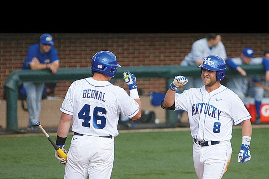 Kentucky+junior+Storm+Wilson+celebrates+his+first+home+run+of+the+season+with+teammate+Thomas+Bernal+during+UKs+game+against+Morehead+State+at+Cliff+Hagan+Stadium+on+Wednesday%2C+March+25%2C+2015+in+Lexington%2C+Kentucky.+Photo+by+Taylor+Pence