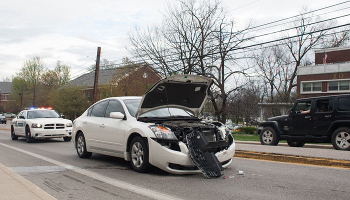 A+damaged+vehicle+sits+alone+on+Rose+Street+following+a+collision+on+Monday%2C+April+13%2C+2015+in+Lexington%2C+Ky.+Photo+by+Adam+Pennavaria