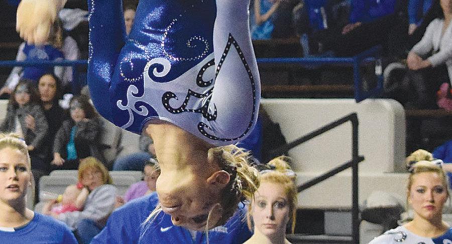 Freshman Sydney Waltz competes during her beam routine on Friday, March 6, 2015 in Lexington, Ky. Photo by Hunter Mitchell