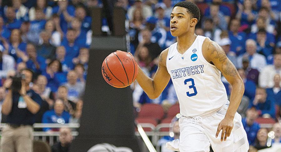 Guard Tyler Ulis of the Kentucky Wildcats drives up the court during the first half of the game against the Hampton Pirates at KFC Yum! Center on Thursday, March 19, 2015 in Louisville , Ky. Kentucky leads Hampton 41-22 at halftime. Photo by Michael Reaves