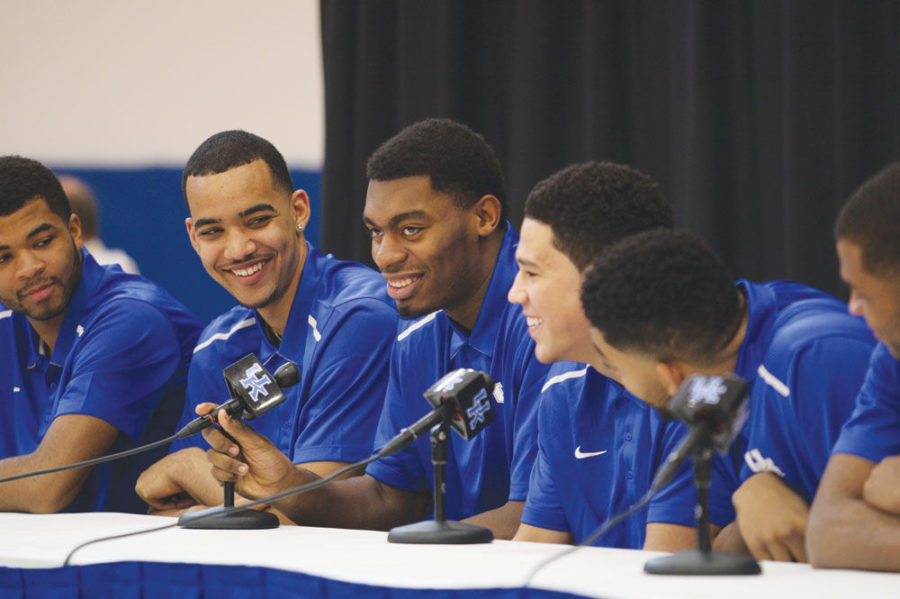 Center+Dakari+Johnson+of+the+Kentucky+Wildcats+laughs+while+answering+a+question+at+Joe+Craft+Center+on+Thursday%2C+April+9%2C+2015+in+Lexington%2C+Ky.+A+record+7+Kentucky+Wildcats+declare+for+the+NBA+draft.+Photo+by+Michael+Reaves