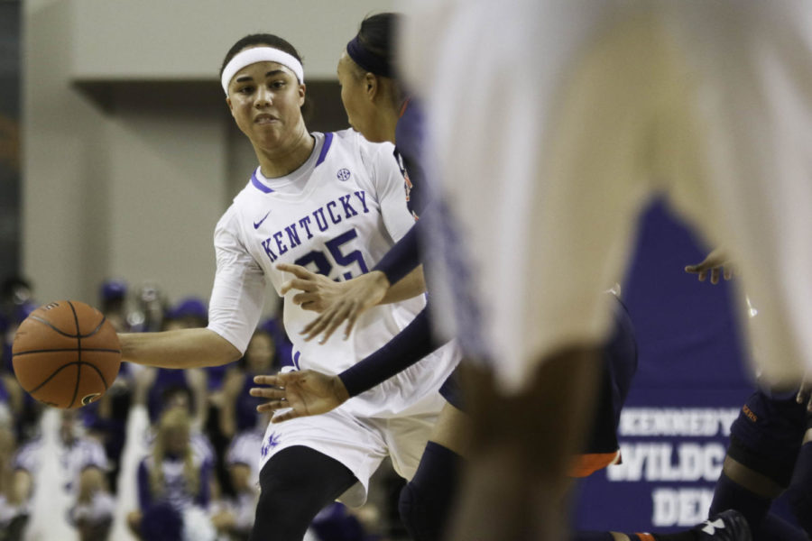 Junior guard Makayla Epps (25) passes the ball around a defender during the game against the Auburn Tigers on Sunday, January 17, 2016 in Lexington,. Kentucky won the game 54-47. Photo by Hunter Mitchell | Staff