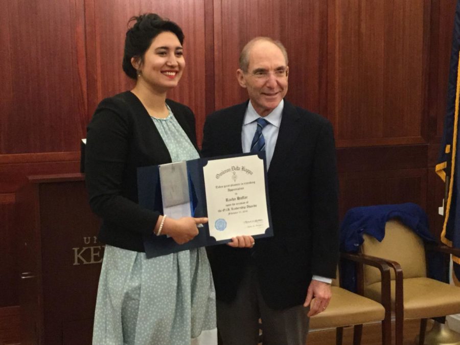President Eli Capilouto stands with Racha Haffar, who teaches at UK and is a womens rights activist and Tunisian journalist. Haffar was awarded the a Leadership Award from Omicron Delta Kappa on Monday.