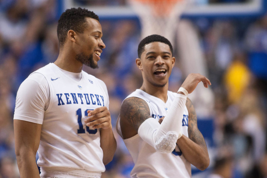 Freshman guard Isaiah Briscoe (13) and sophomore guard Tyler Ulis (3) laugh after a timeout during the game against the Alabama Crimson Tide on Tuesday, February 23, 2016 in Lexington, Ky. Kentucky won the game 78-53. Photo by Hunter Mitchell | Staff