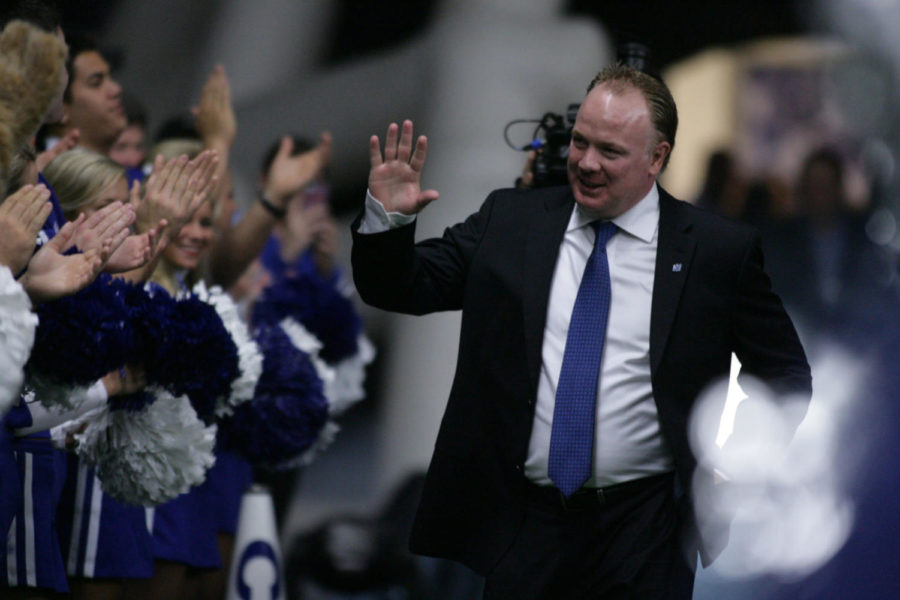 University of Kentuckys new head football coach, Mark Stoops, makes his way to the conference table at during the Live Press Conference held at the Nutter Training Facility in Lexington, KY on Sunday December 2nd, 2012. Photo by Kirsten Holliday | Staff