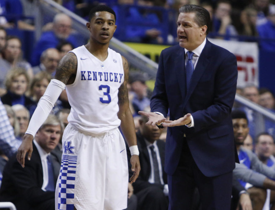 Head coach John Calipari talks with Guard Tyler Ulis on the sidelines in the game against Tennessee.