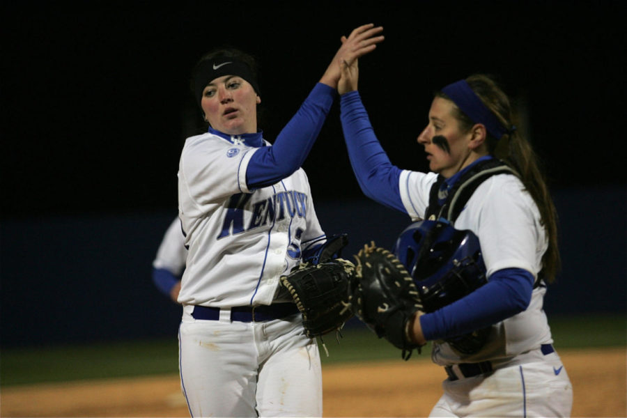 Freshman pitcher Kelsey Nunley and sophomore catcher Griffin Joiner celebrate the win at the UK vs. WKU game at the softball complex in Lexington, Ky., on Tuesday, March 19, 2013. Photo by Michael Reaves | Staff