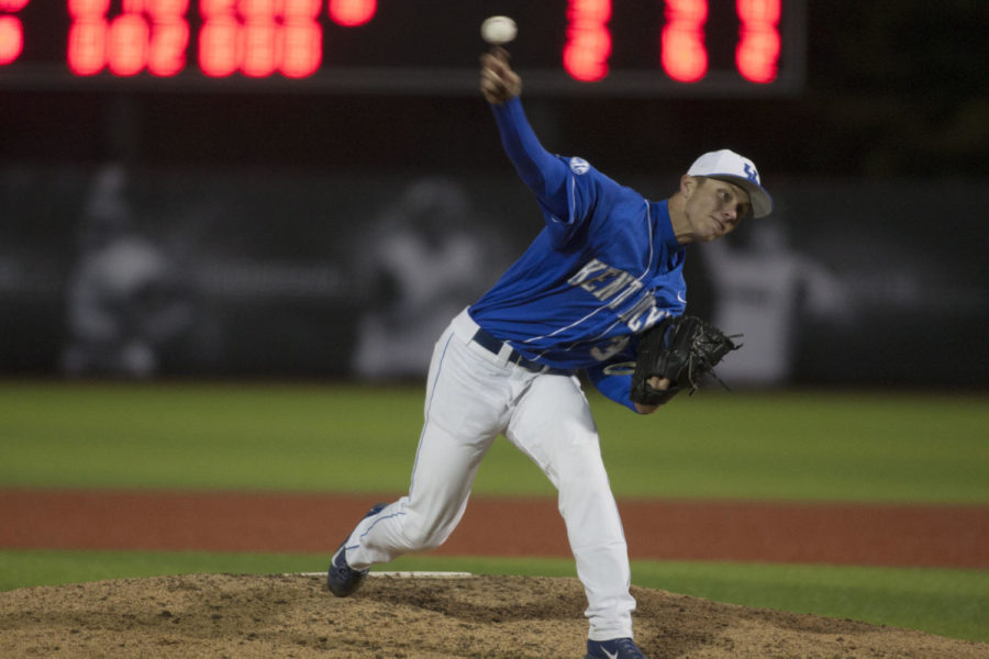 Freshman pitcher Zack Brown pitches during the game between the University of Kentucky baseball team vs. University of Louisville at Jim Patterson Stadium in Louisville, Ky.,on Tuesday, April 15, 2014. Photo by Michael Reaves | Staff 