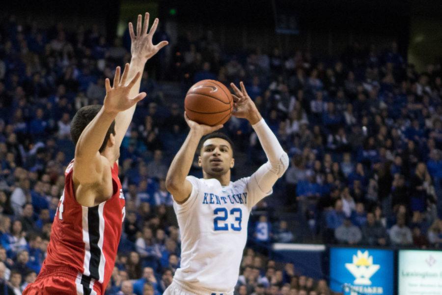 UK guard Jamal Murray puts up a 3 point shot while Georgia guard Brandon Young at the University of Kentucky vs. University of Georgia basketball game on Tuesday, February 9, 2016 in Louisville, KY. Photo by Cameron Sadler | Staff 