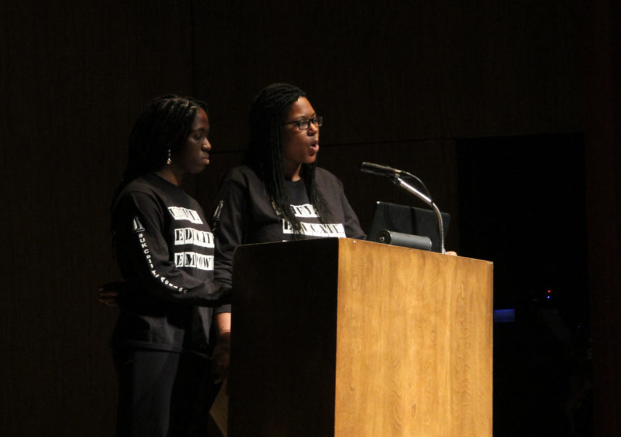 Students Erica LittleJohn and Eseosa Ighodaro lead the UK Call to Action Town Hall at the Singletary Center on Monday.