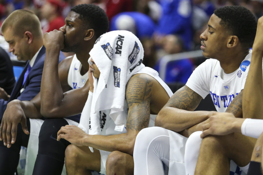 Guard Tyler UIis and forward Alex Poythress of the Kentucky Wildcats sit in dejection during the NCAA Tournament second round game against the Indiana Hoosiers at Wells Fargo Arena on Saturday, March 19, 2016 in Des Moines, Iowa. Kentucky fell to Indiana 73-67. Photo by Michael Reaves | Staff.